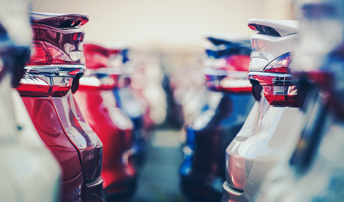 a row of cars ready to be sold